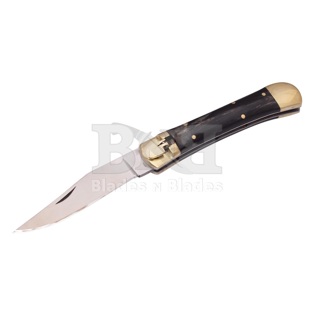 Micarta handle Brass
Bolster just Black is Buffalo
horn and D2 steel blade