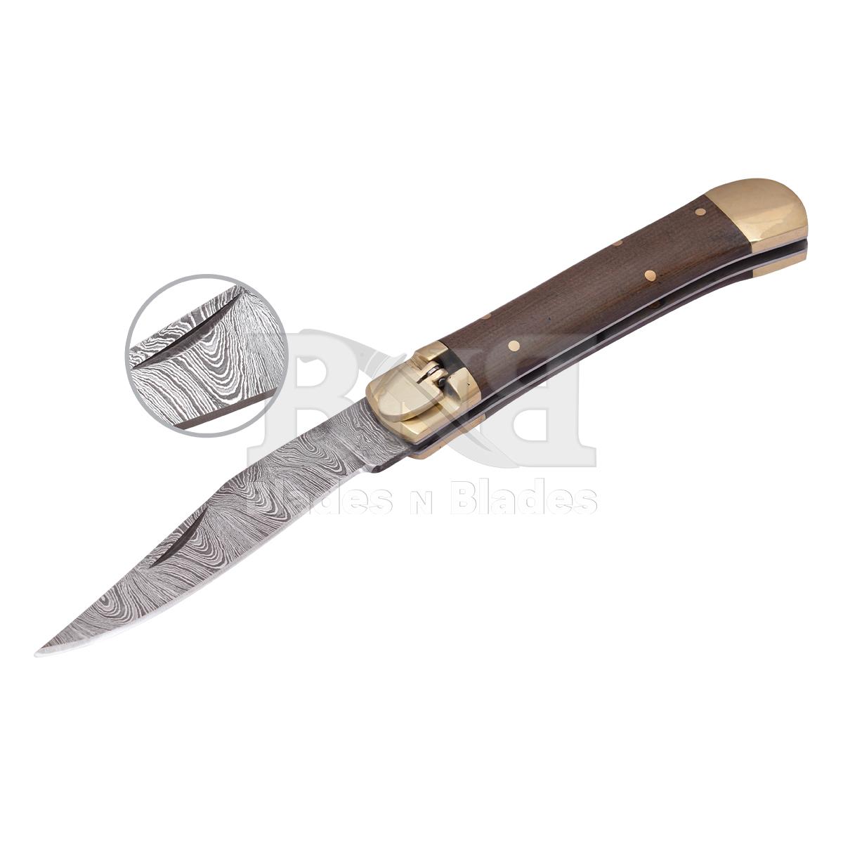 Micarta handle Brass
Bolster just Black is Buffalo
horn and D2 steel blade