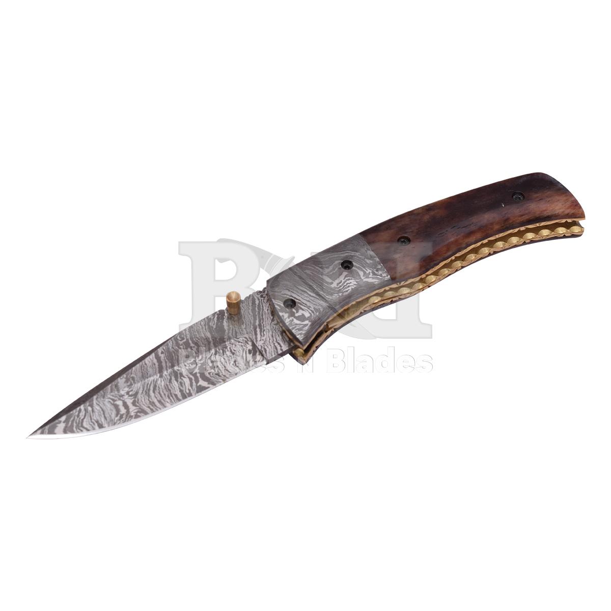Fire Pattern
Ram horn handle with brass pin
Damascus steel bester