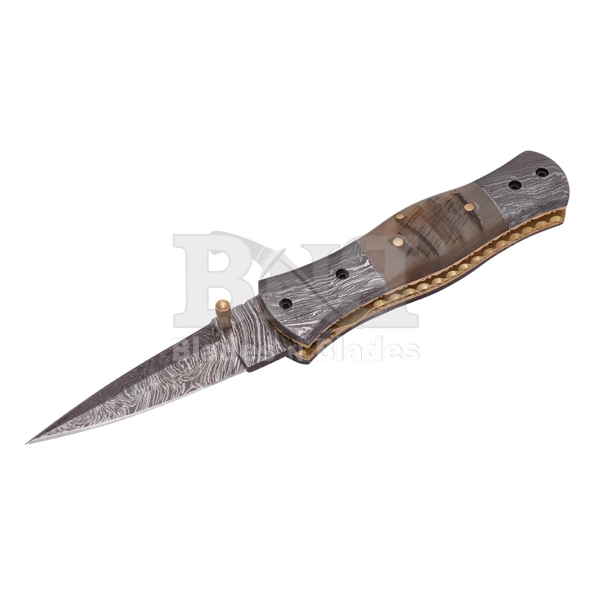 Fire Pattern
Ram horn handle with brass pin
Damascus steel bester