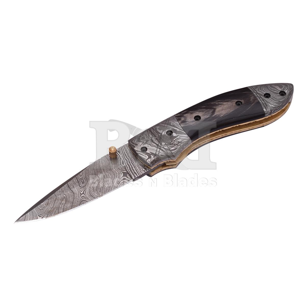 Fire Pattern
Bufflu horn handle with
Damascus bester