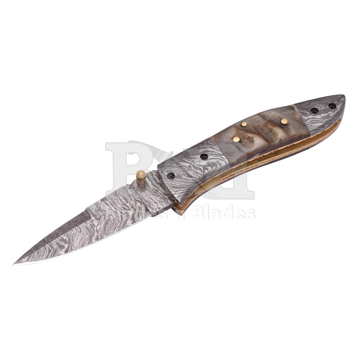 Fire Pattern
Bufflu horn handle with
Damascus bester