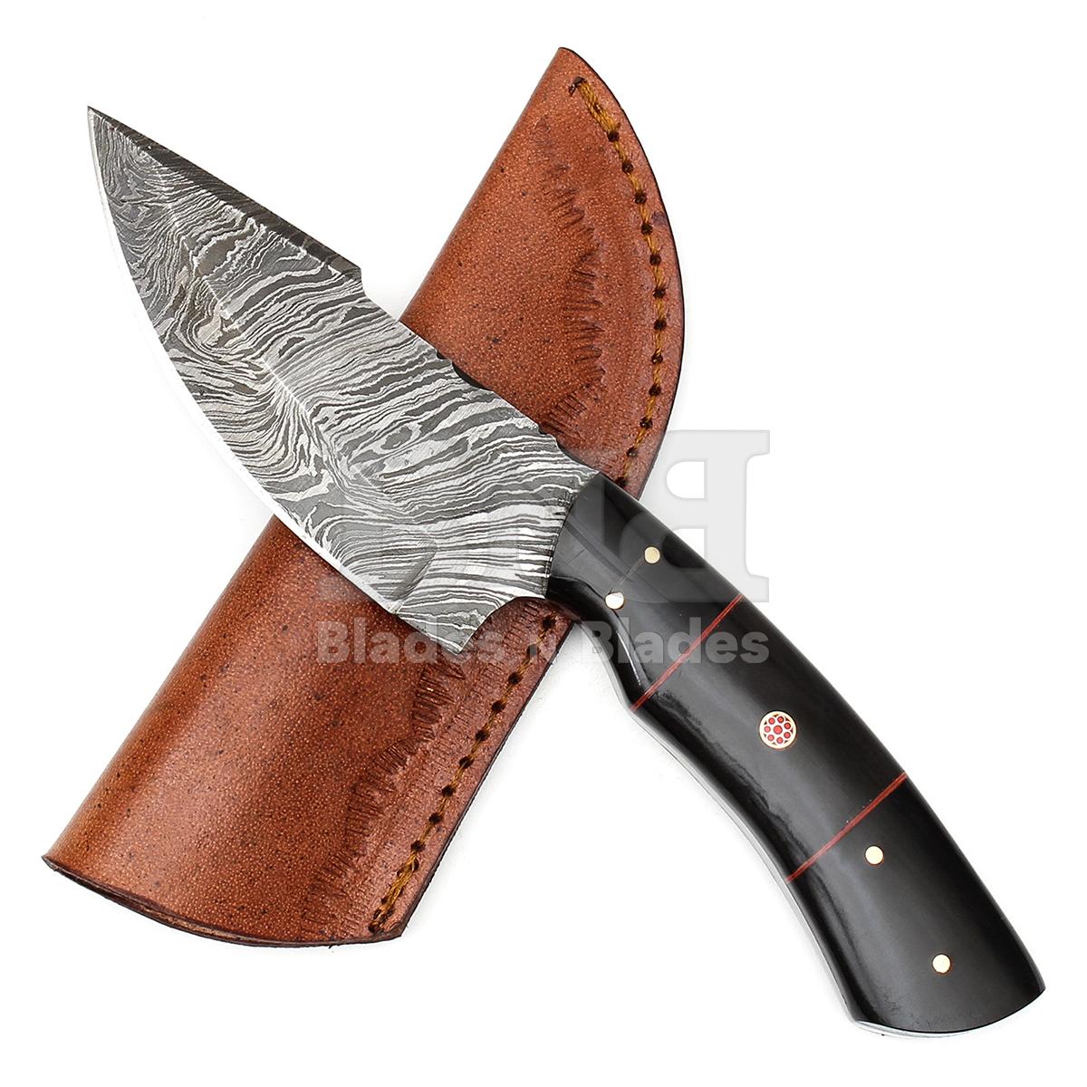 Fire Pattern Blade
Full Tang with Filework
Buffalo Horn handle
with Red Fiber Spacers