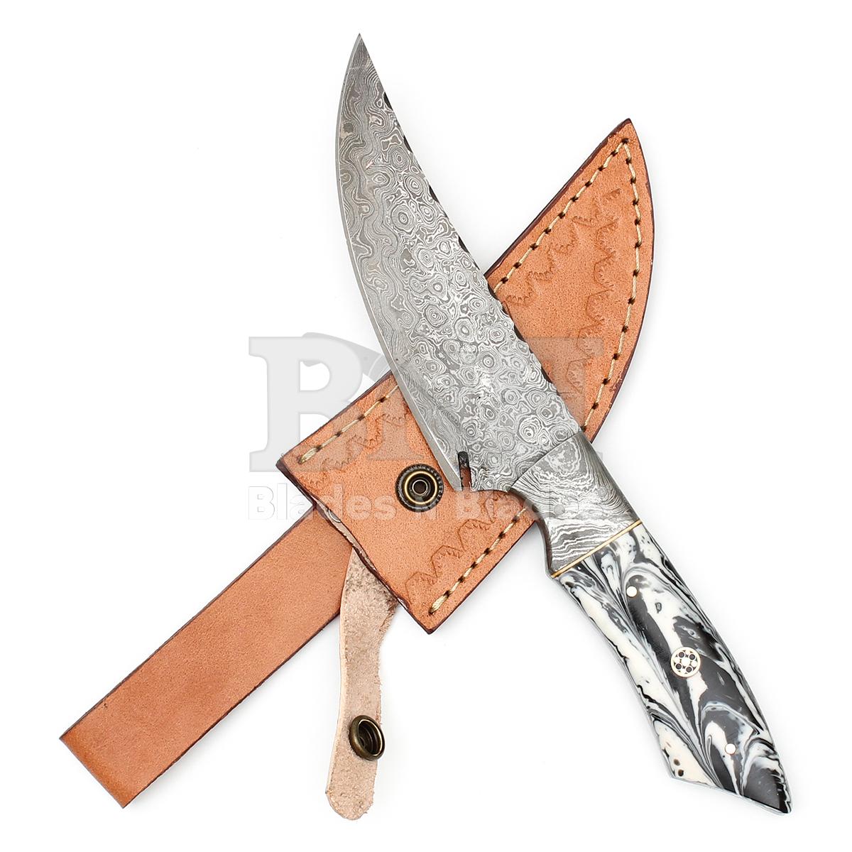 Raindrop Pattern Blade
with Damascus Steel Bolster
Full tang Resin Handle