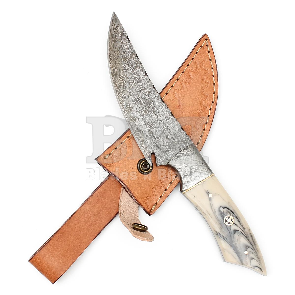 Raindrop Pattern Blade
with Damascus Steel Bolster
Full tang Resin Handle