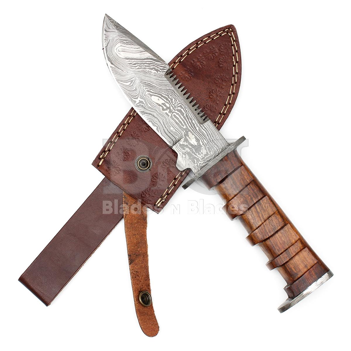 Twist Pattern Blade Sawback
and Damascus Steel Guard
Hidden Tang Rosewood
Engraved Handle